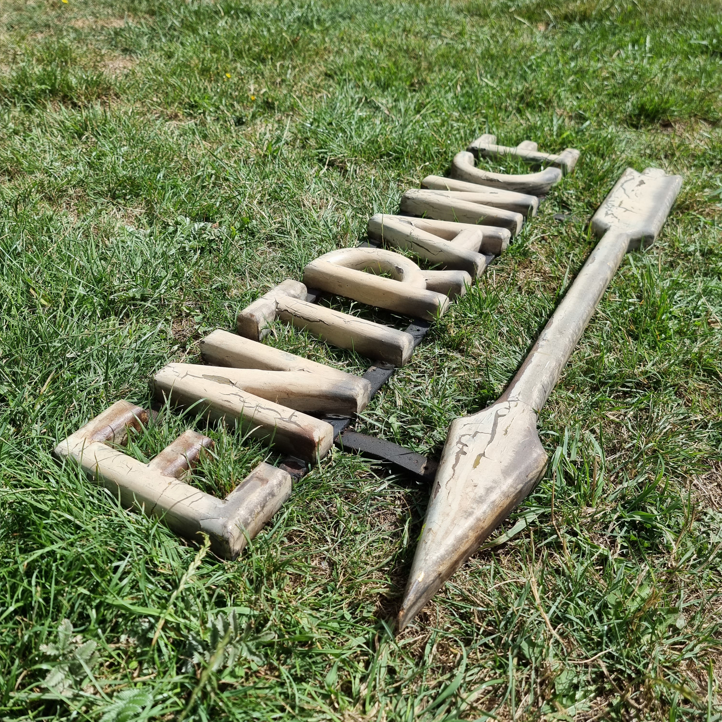 Hanging Railway Entrance Sign